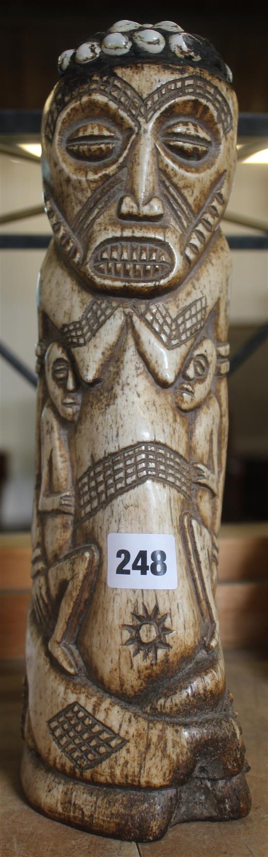 Kenyan carved camel bone fertility figure